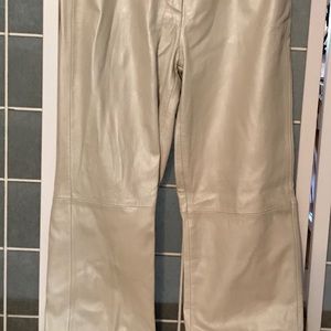 100% soft leather, lined, unfinished hem